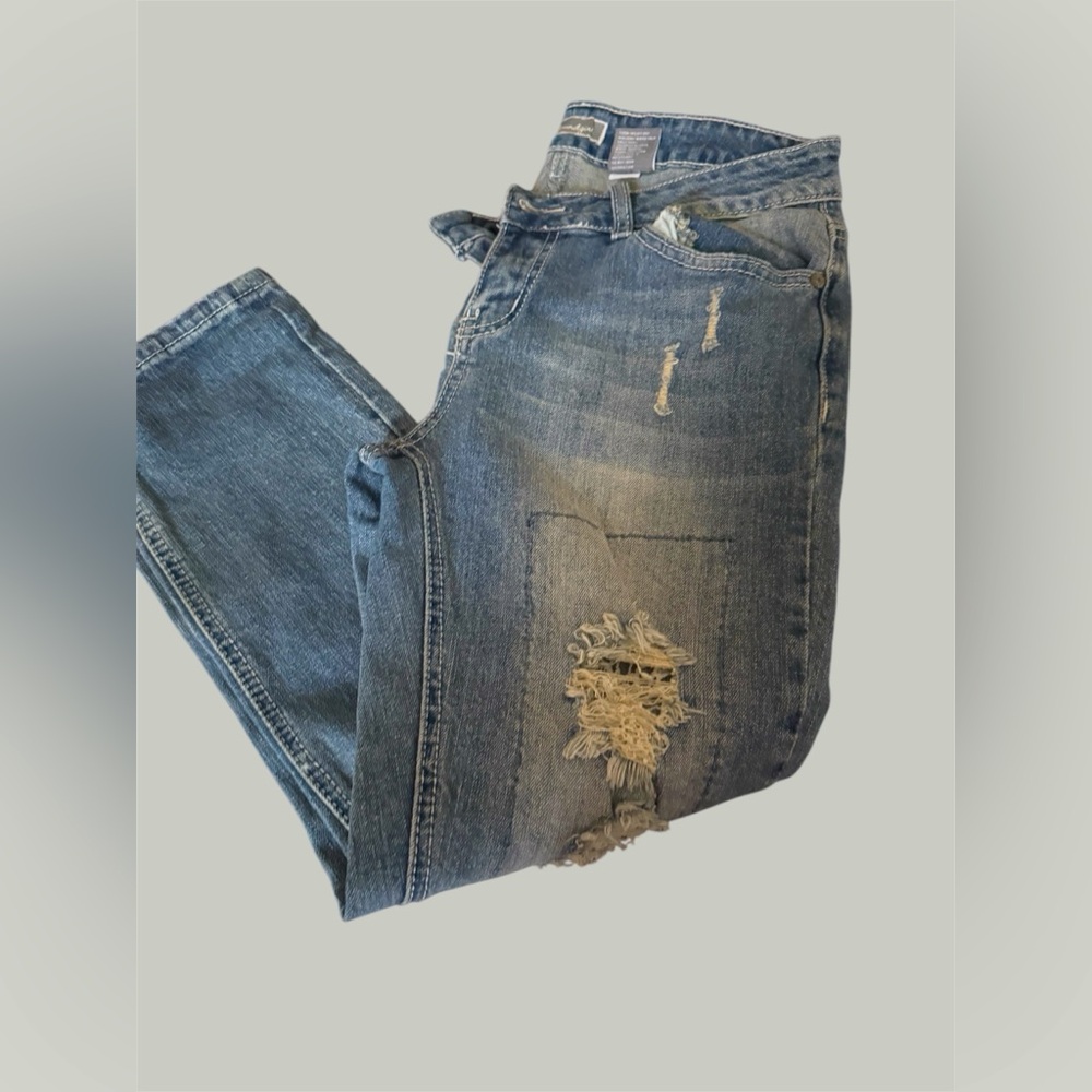 Woman Distressed Blue Jeans